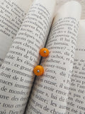 Clous d'oreilles jaune-orangé